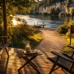 Camping la riviere lacave : terrasse mobil-home au bord de la Dordogne